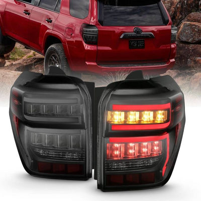 ANZO - 2014-2022 TOYOTA 4RUNNER TAILLIGHTS BLACK HOUSING SMOKE LENS RED LIGHT BAR WITH SEQUENTIAL-Tail Lights-Deviate Dezigns (DV8DZ9)