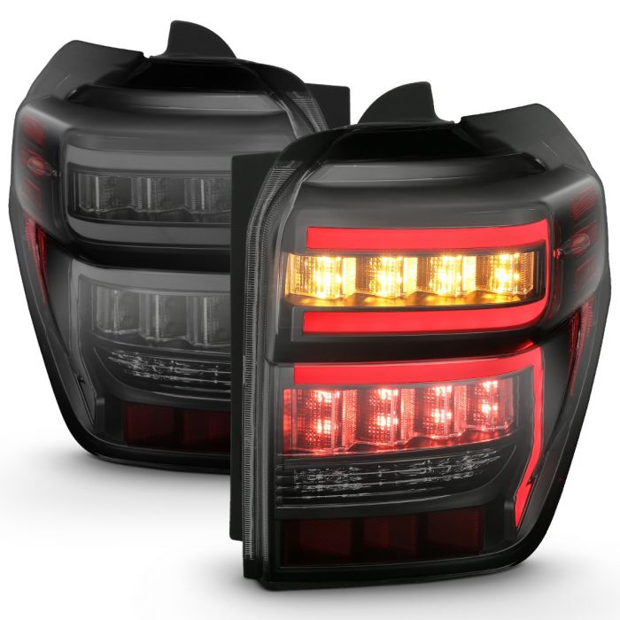 ANZO - 2014-2022 TOYOTA 4RUNNER TAILLIGHTS BLACK HOUSING SMOKE LENS RED LIGHT BAR WITH SEQUENTIAL-Tail Lights-Deviate Dezigns (DV8DZ9)